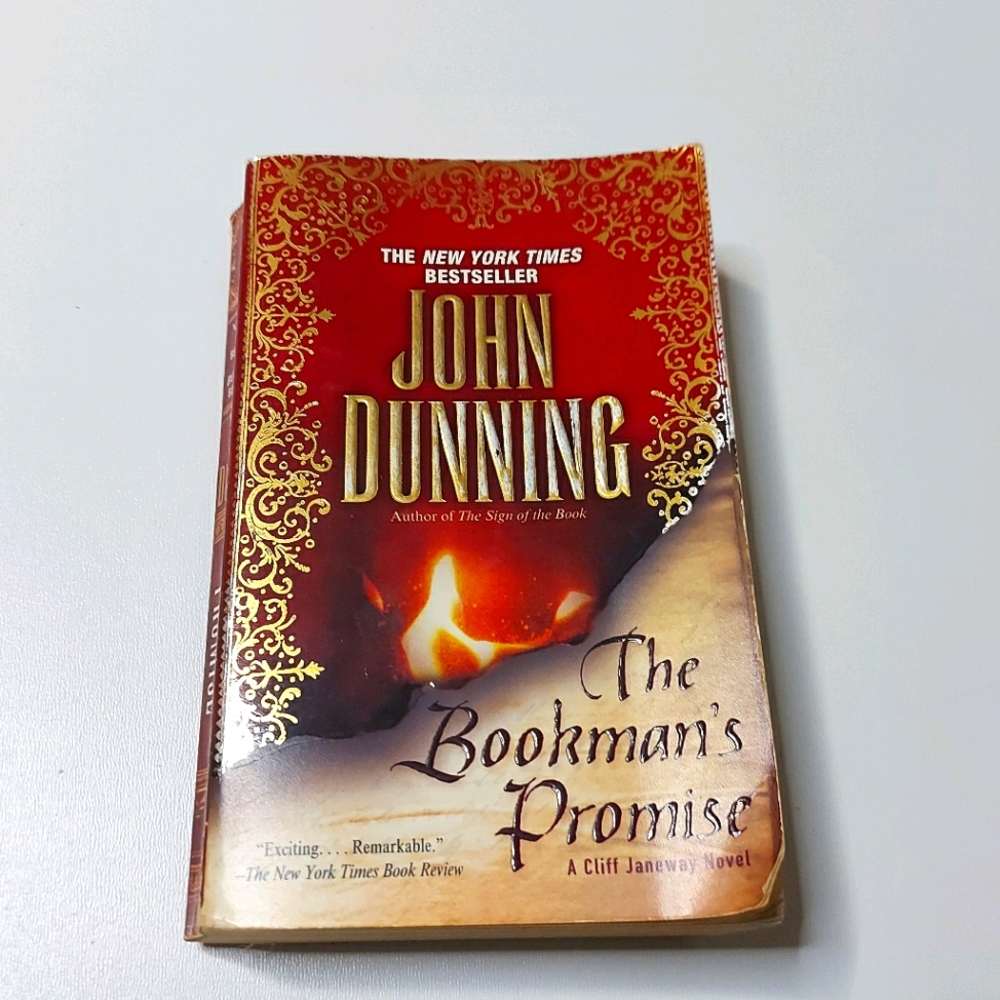Free When You Spend $50 John Dunning - The Bookman's Promise